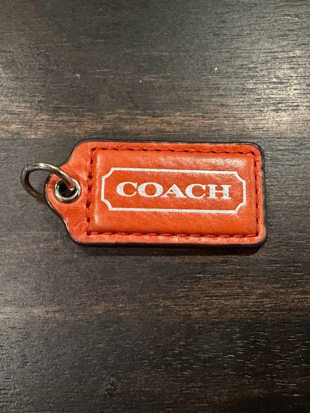 Orange Coach Hangtag